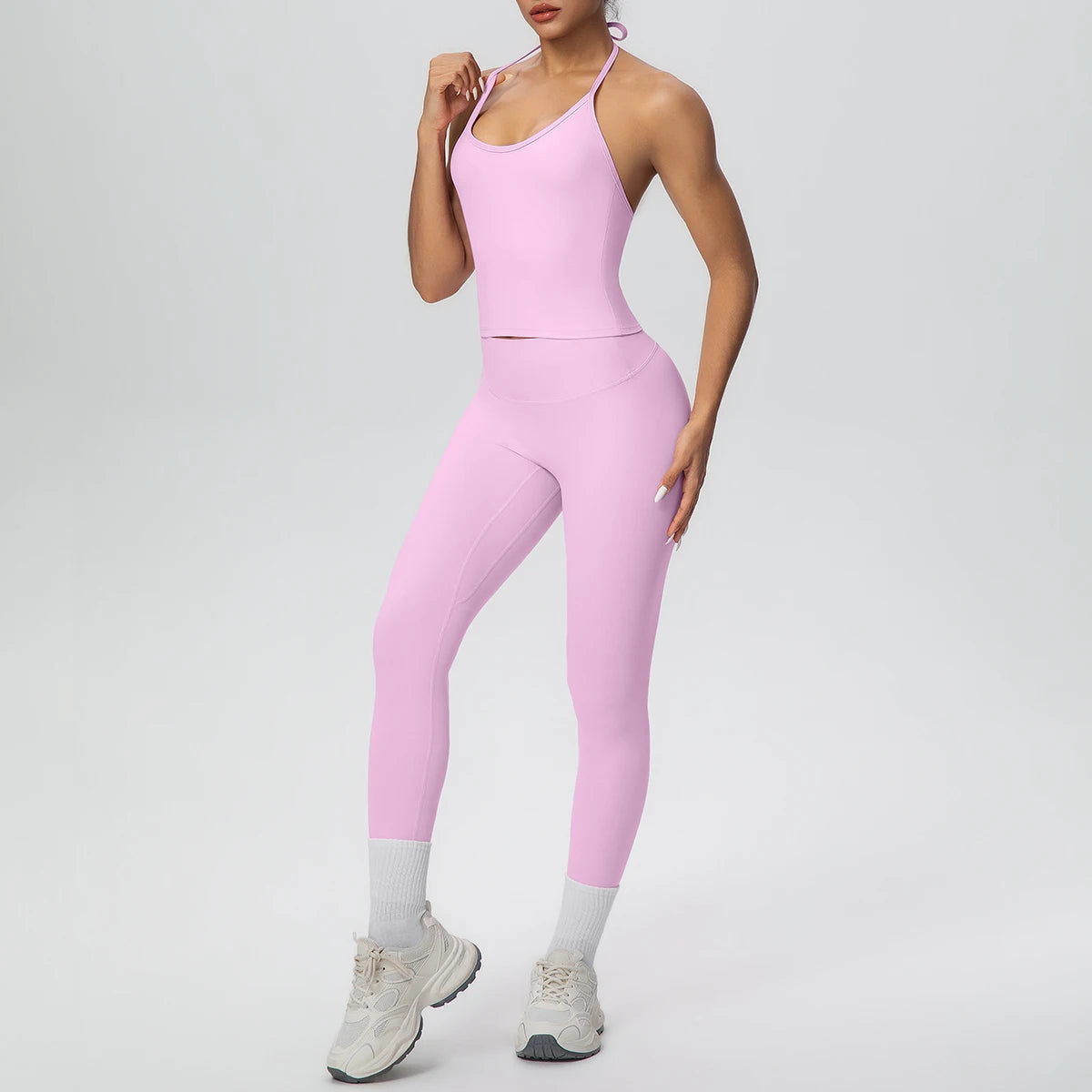 Rosa Damen-Yogaset: Tanktop und Capri-Leggings mit hellen Knöchel-Bündchen