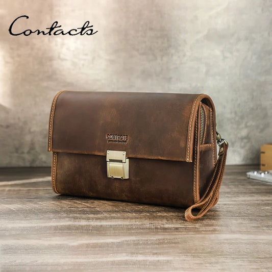 Braune Leder-Clutch mit Umschlag und Metallschloss sowie seitlicher Trageschlaufe