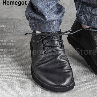 Schwarze Herren-Lederschuhe mit Schnürung und dicker Profilsohle