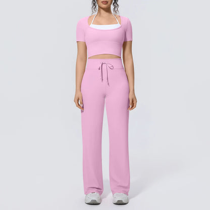 Rosa Yoga-Set mit kurzem Top und langer weiter Hose, Frontansicht