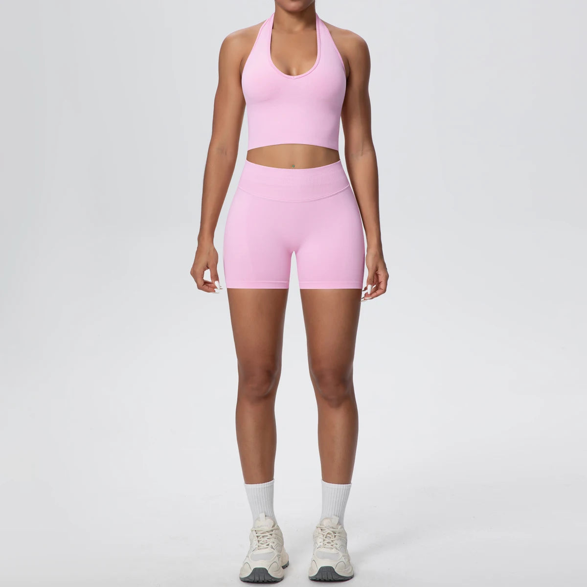 Hochtailliertes Sportset für Damen: pinkes ärmelloses Top und Shorts, atmungsaktiv