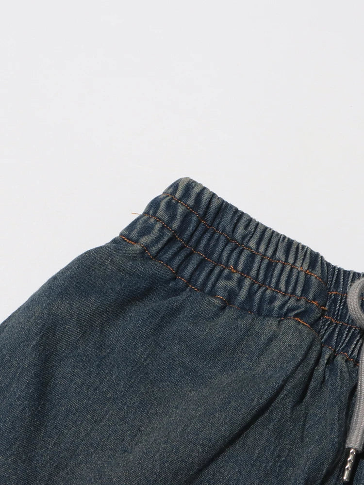 Ärmelloses Damen-Midikleid mit Rundhalsausschnitt und Patchwork-Falten im Colorblock-Design – figurbetont und stilvoll.