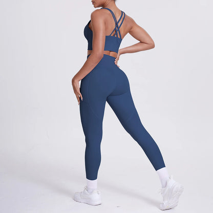Damen-Yoga-Set in dunkelblau mit Rücken-Cross-Straps am Sporttop und 3/4 Leggings