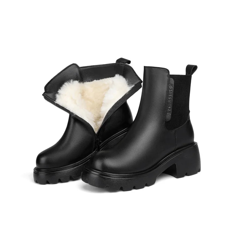Schwarzer Chelsea-Boot mit Wollfutter, kurzer Schaft und seitlichem Elastikeinsatz