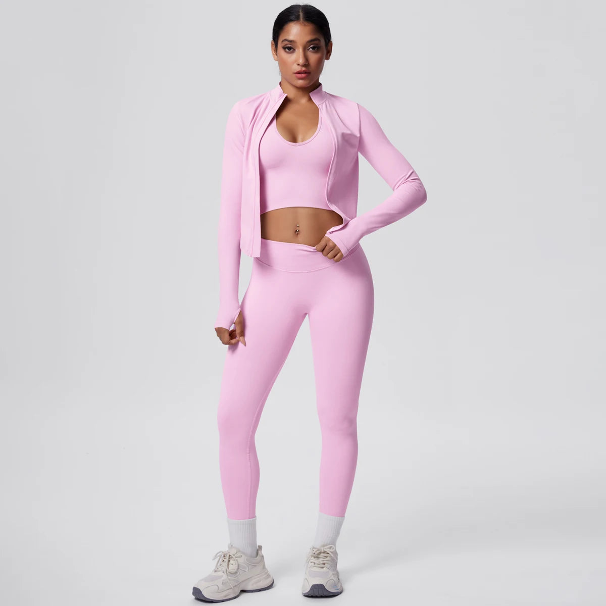 Rosa Yoga-Set mit Push-up-Top und hochtaillierter Leggings, stehende Frontansicht