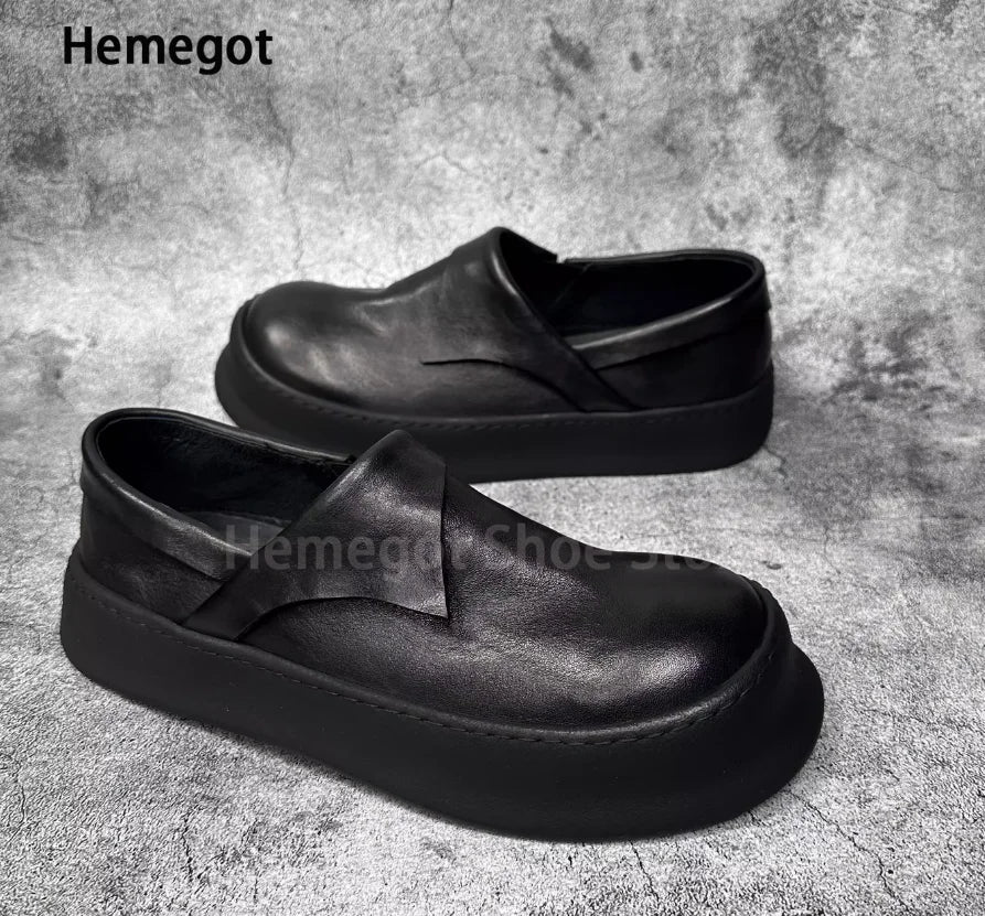 Schwarze Loafer aus Leder mit Einstiegsschlitz und dicker Profilsohle