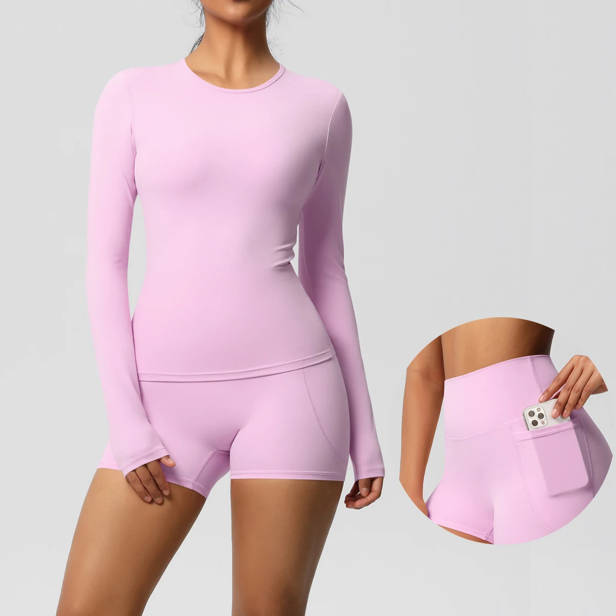 Damen-Yoga-Set Rosa mit langarmigem Shirt und kurzen Shorts, Taschenansicht