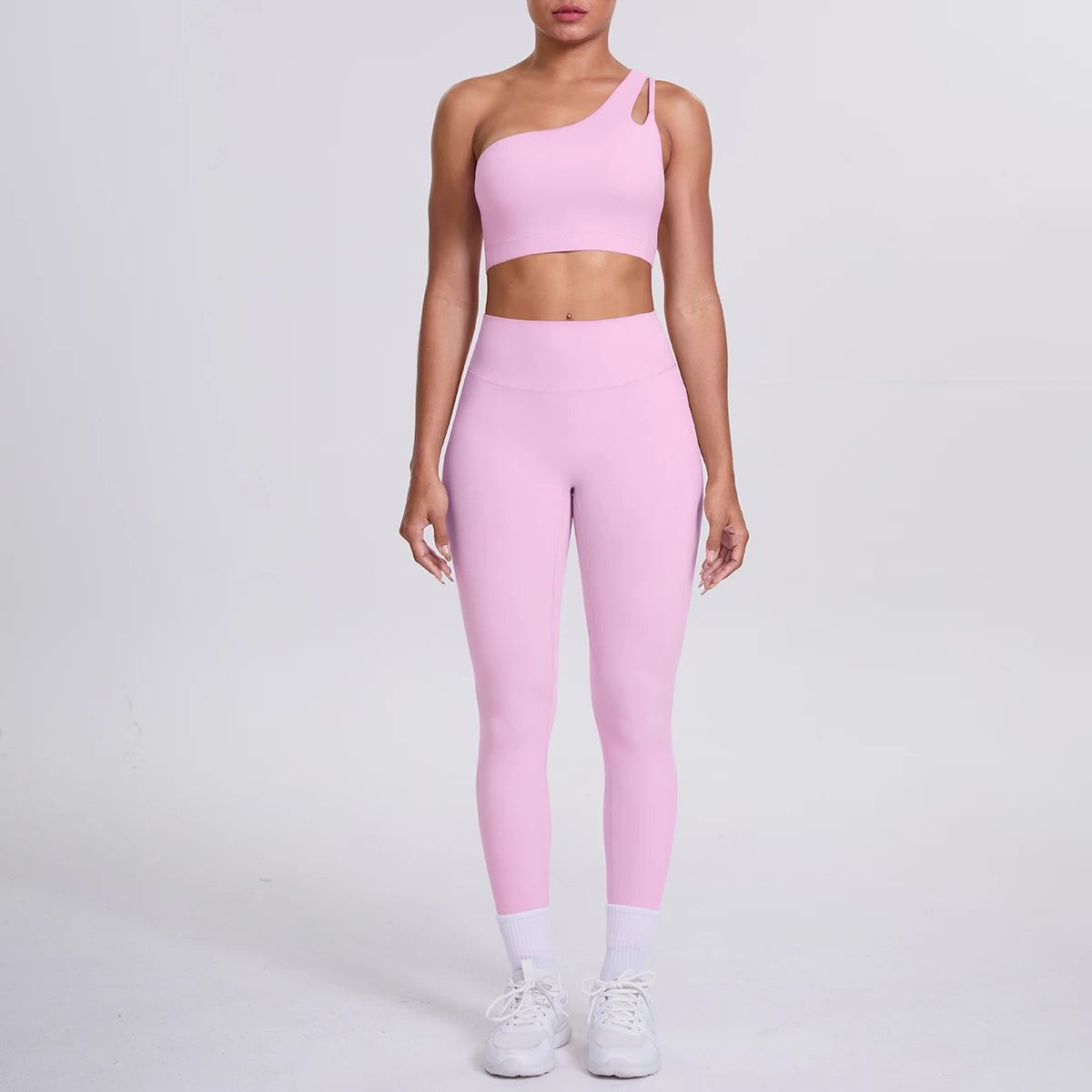 Yoga-Set Damen: rosafarbenes Crop-Top mit Neckholder und Leggings