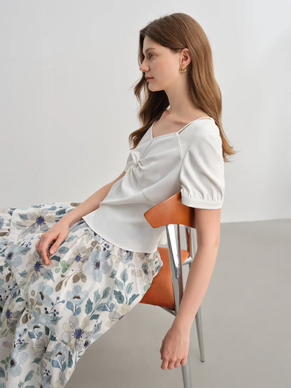 Kurzarm-Stricktop mit Puppenkragen für Damen in Plusgröße – modisch und elegant für den Sommer.