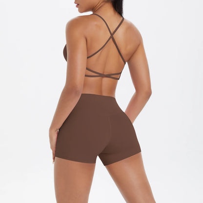 Damen-Yoga-Set: Crop-Top mit gekreuzten Rückenträgern und Shorts, braun/dunkel