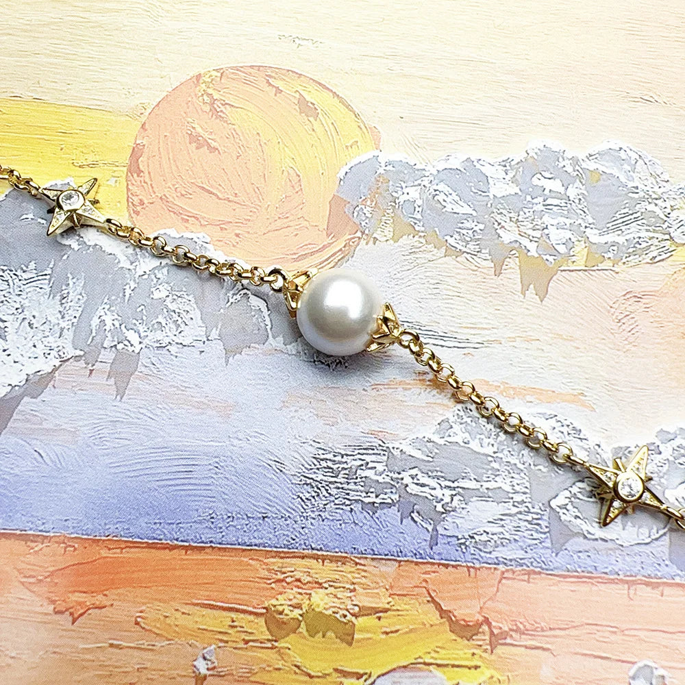 Damen-Armband Perlen Sterne Gold kosmisch aus Sterlingsilber