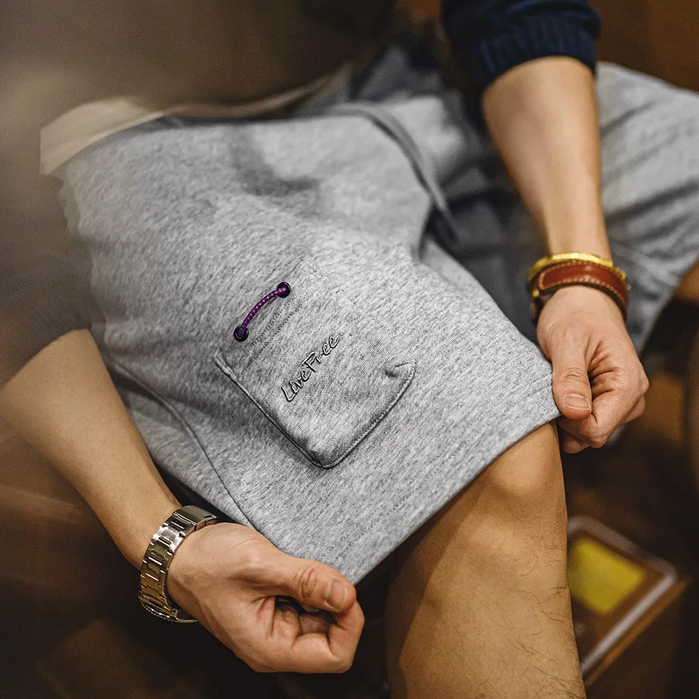 Herren Jogger-Shorts aus atmungsaktivem Material mit elastischer Taille und lockerer Passform