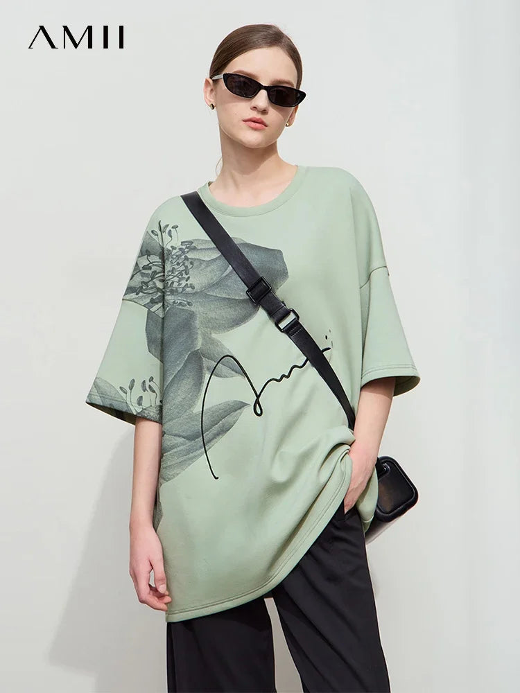 Damen T-Shirt mit lockerem O-Ausschnitt und Blumenmuster sowie Stickerei