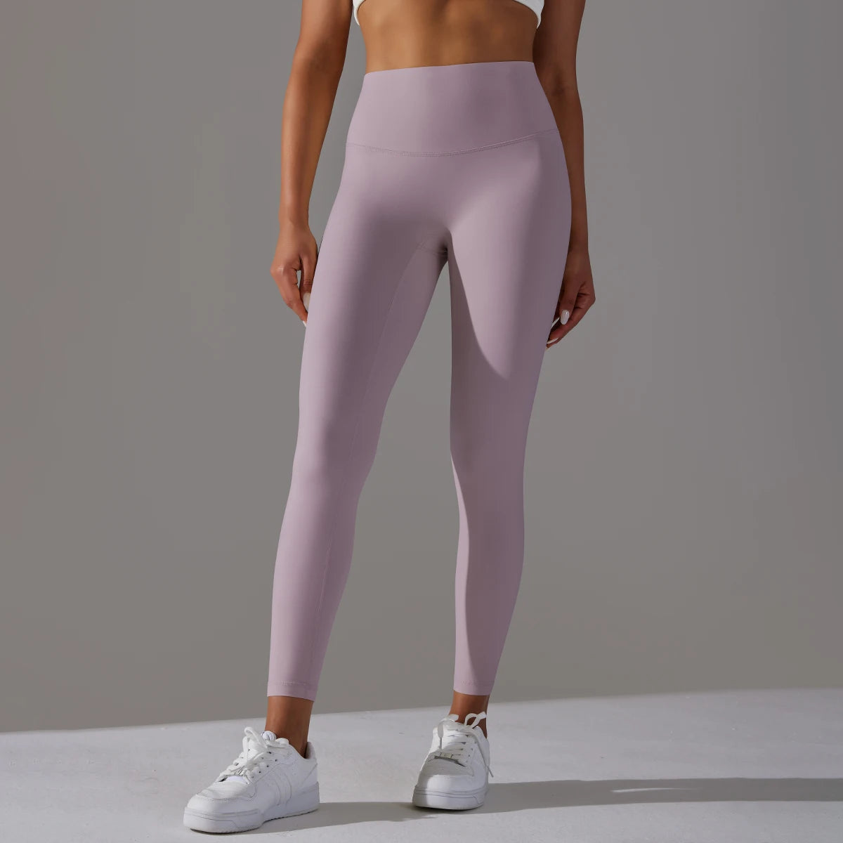 Nahtlose Yogahose, hoch tailliert, Flieder, seitliche Ansicht, ohne sichtbare Nähte.