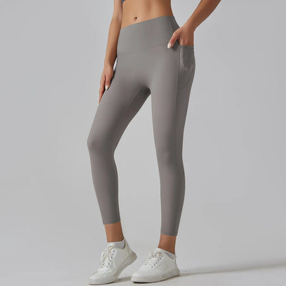Graue High-Waist-Leggings mit Taschen, Ganzkörper-Seitenansicht