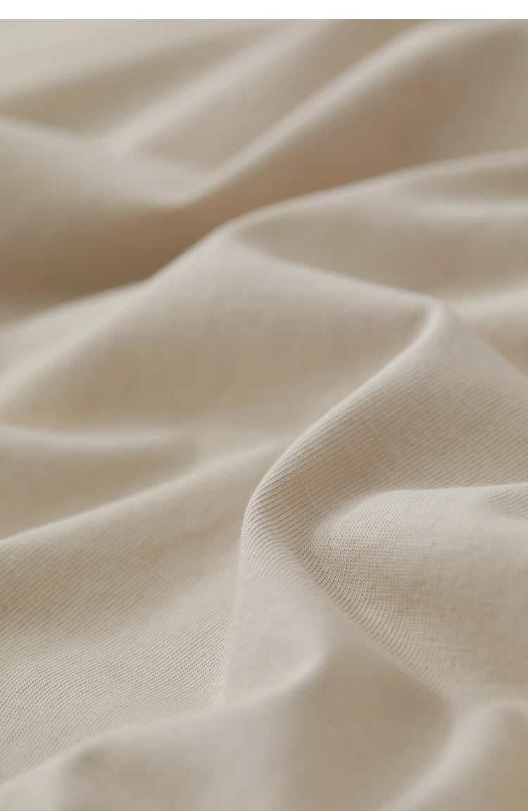 Damen T-Shirt im Minimalismus-Stil mit O-Neck und coolen Ink-Art Print