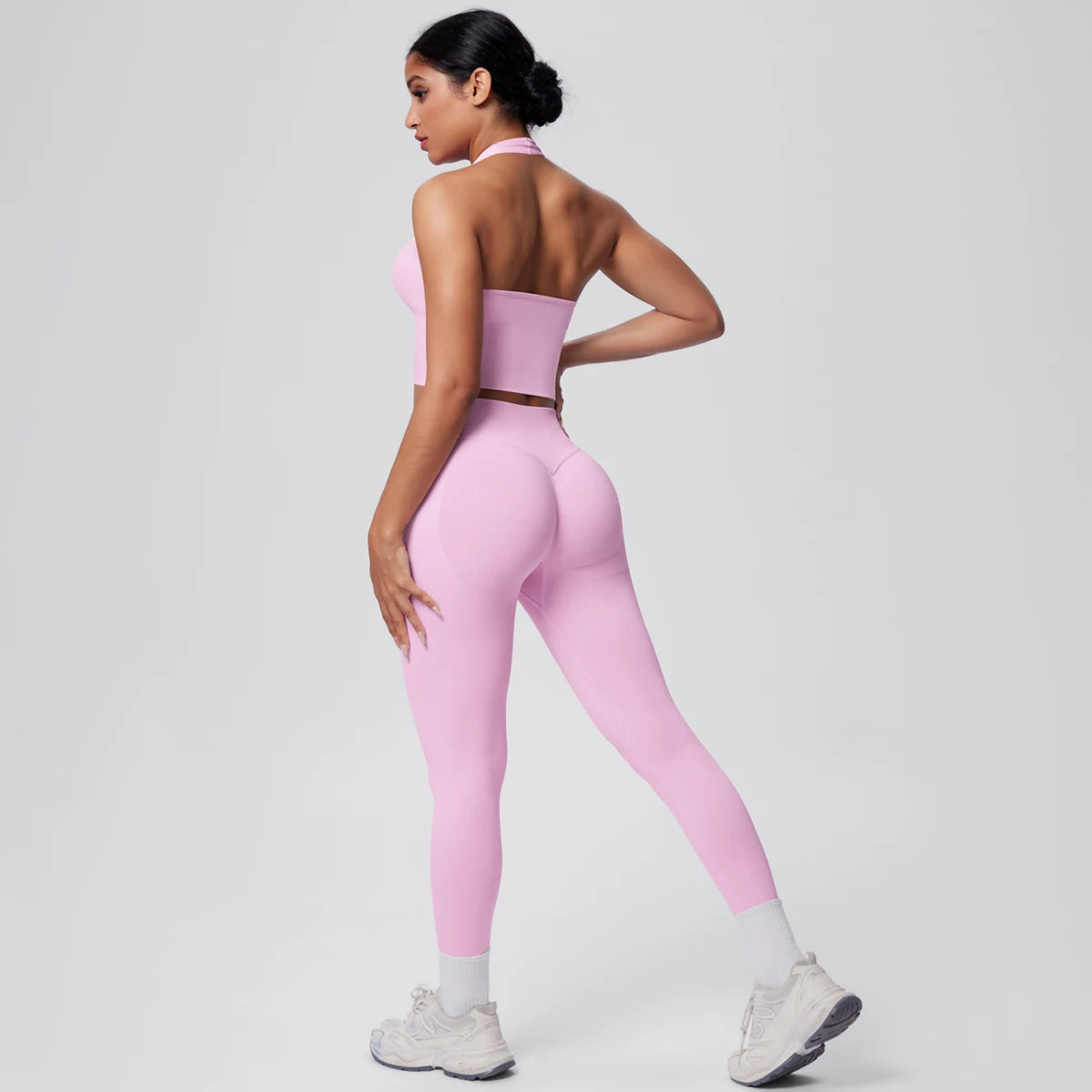 Yoga-Set für Frauen, Rückansicht: Sport-BH und Leggings, pfirsichrosa, kurze Nahtkanten.