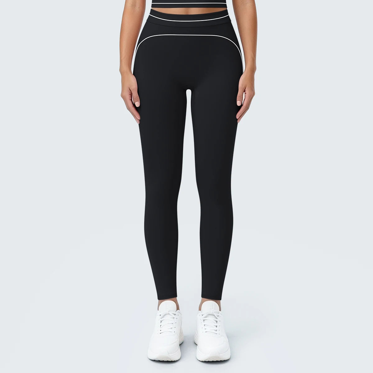 Nahtlose Yoga-Leggings mit hoher Taille, schwarz, enges Bein mit dezenter Umrandung.