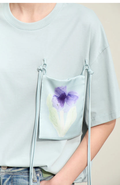 Damen T-Shirt im Minimalismus-Stil mit Taschen und elastischem O-Neck