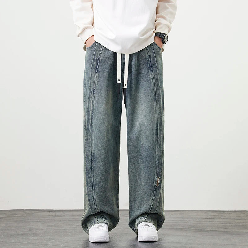 Herren Jeanshose mit brauner Stickerei im Hip Hop Stil