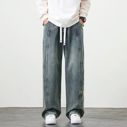 Herren Jeanshose mit brauner Stickerei im Hip Hop Stil