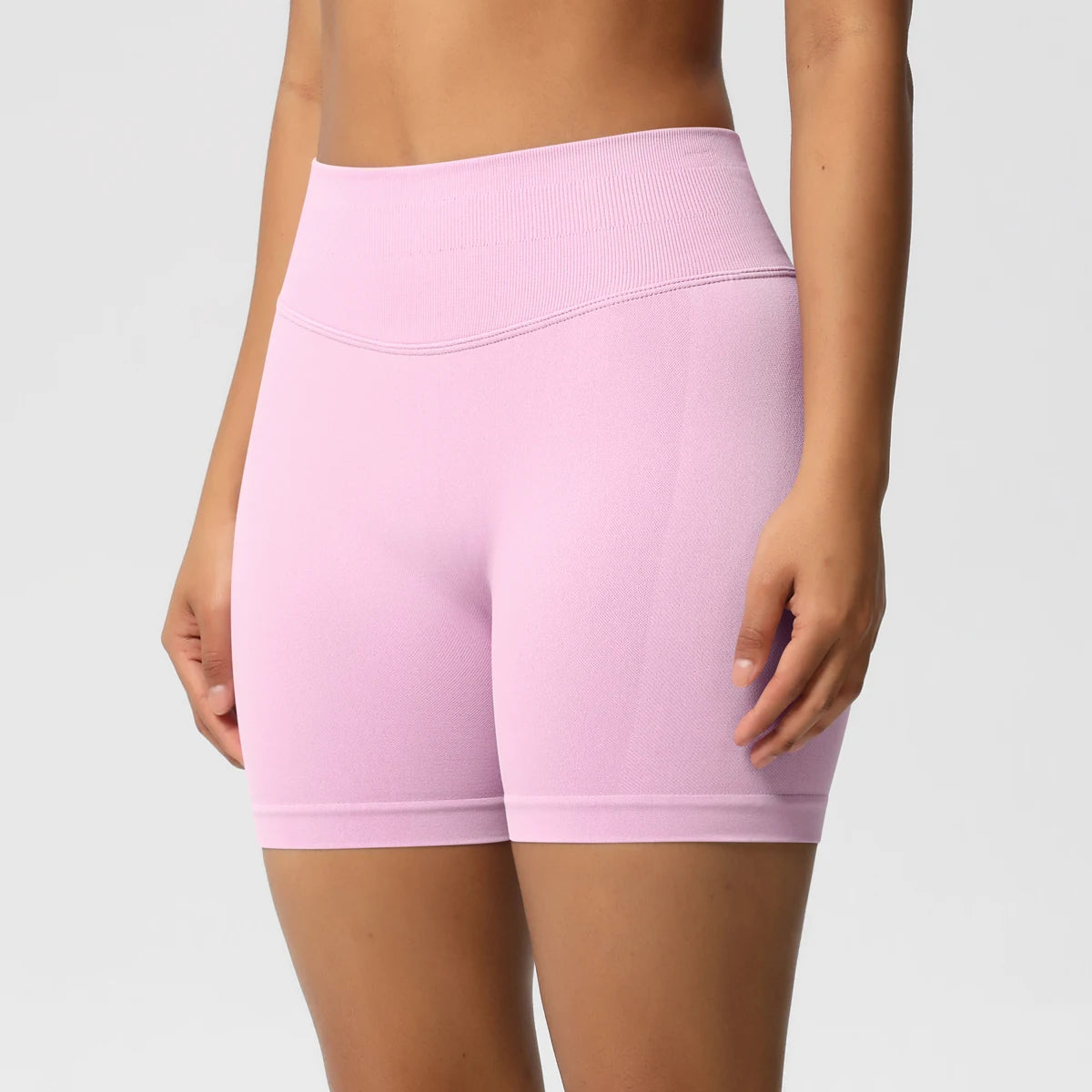 Damen-Yoga-Shorts High-Waist, rosa, glatter Sitz mit gerader Saumkante hinten