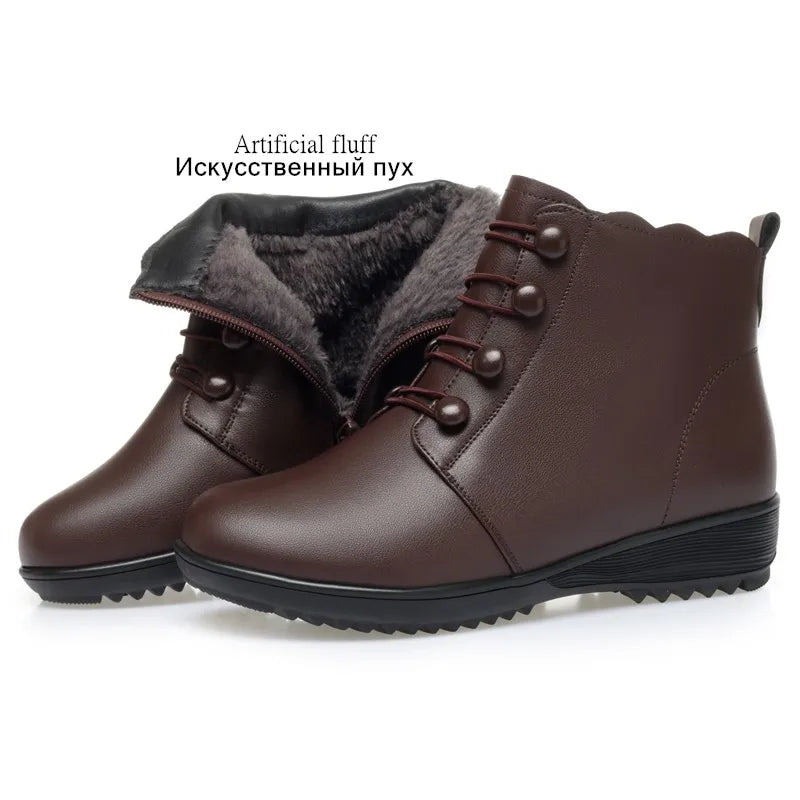 Braune Damen-Winterstiefelette mit Schnürung und dunkelgrauem Fellbesatz, Profilsohle