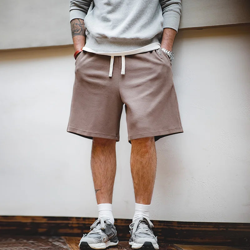Herren Freizeitshorts aus atmungsaktivem Material mit gesticktem Blitzdesign