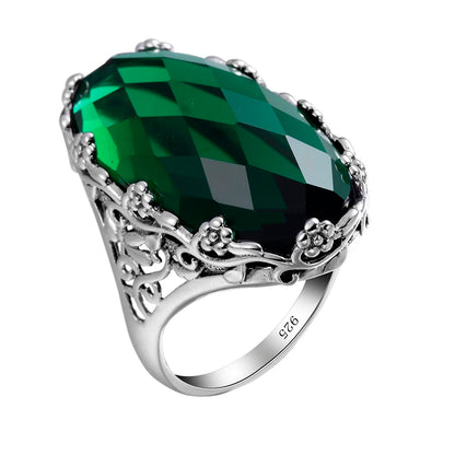 Damen-Ring aus 925er Sterlingsilber mit smaragdgrünem Stein und aufwändigem Blütenmuster