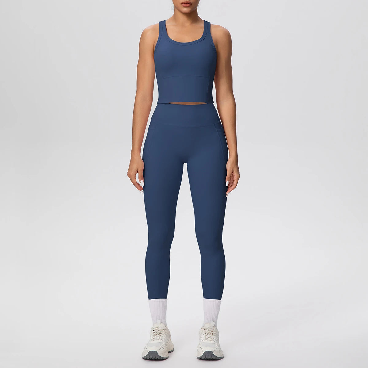 Yoga-Sportset in Dunkelblau: ärmelloses Top und High-Waist Leggings mit Kontrastknöchelband