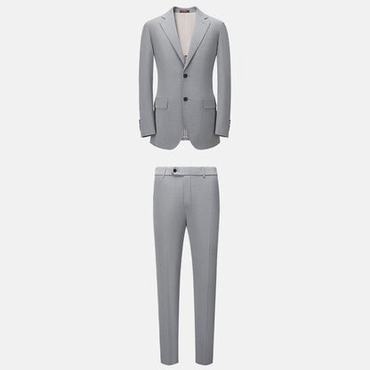 Schlanker Herren-Blazer im klassischen europäischen Stil mit hellbraunem Karomuster – ideal für Hochzeiten und formelle Anlässe