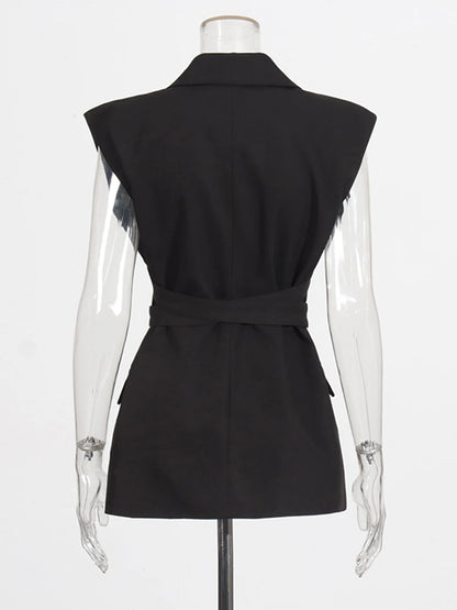 Elegantes ärmelloses Minikleid mit Rundhalsausschnitt und Pailletten-Patchwork für Damen – figurbetont und mit Schleifendetail.