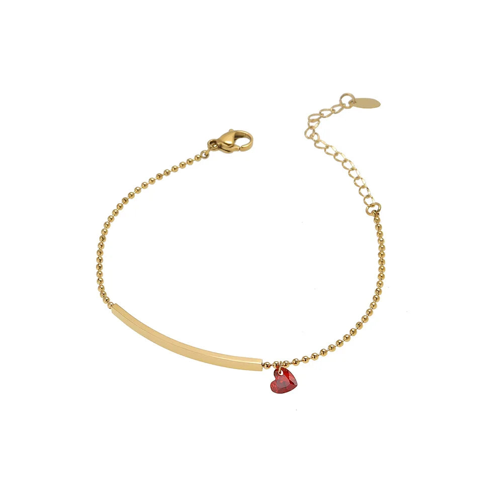 Goldfarbenes Damenarmband mit rotem Zirkonia-Herz am Gliederarmband