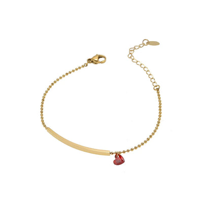 Goldfarbenes Damenarmband mit rotem Zirkonia-Herz am Gliederarmband
