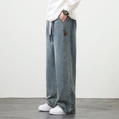 Männer Jeans mit elastischer Taille in schwarz-blauer Farbgebung im Hip Hop Stil