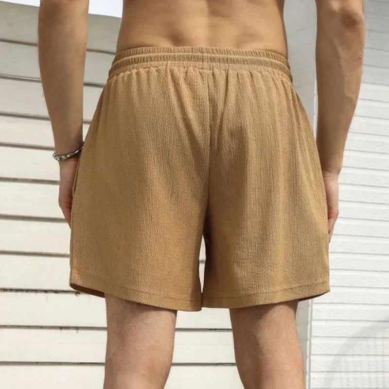 Leichte Herren-Sportshorts aus Eisseide – lockere, knielange Sommerhose in Schwarz