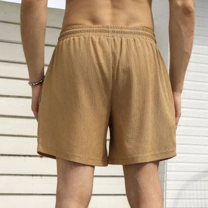 Leichte Herren-Sportshorts aus Eisseide – lockere, knielange Sommerhose in Schwarz