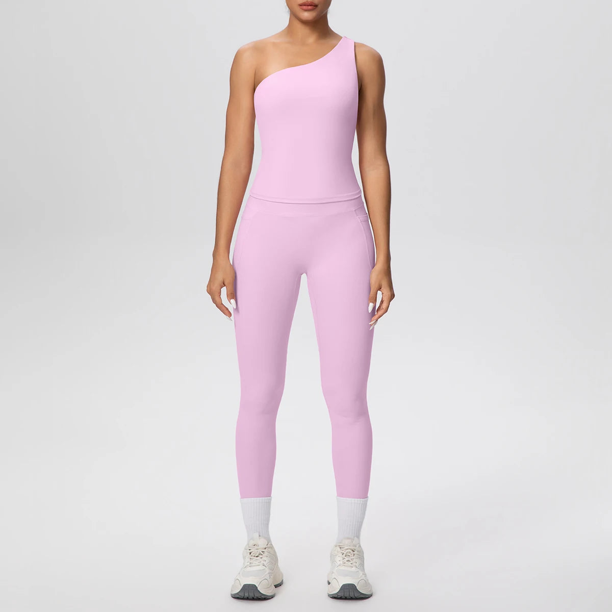 Yoga-Set aus ärmellosem Top und Leggings, hellrosa mit hellem Beinabschluss