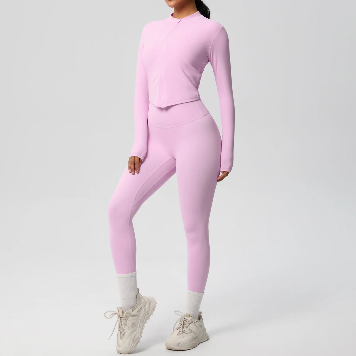 Zweiteiliger Damen-Yogaanzug, Slim Fit, langärmeliges Oberteil und Leggings in Hellrosa