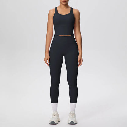 Yoga-Sportset in Schwarz: ärmelloses Top und High-Waist Leggings mit Kontrastknöchelband