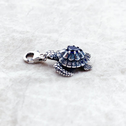 Damen-Charm-Anhaenger Schildkroete blaue Steine aus Sterlingsilber