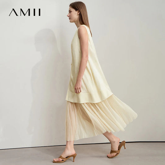 Viskose-Kleid ärmellos in Creme mit Faltenrock und kurzem, ausgestelltem Saum