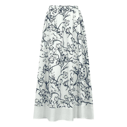 Langer Damenrock: weißer Stoff mit blauem Blumenprint, elastischer Bund