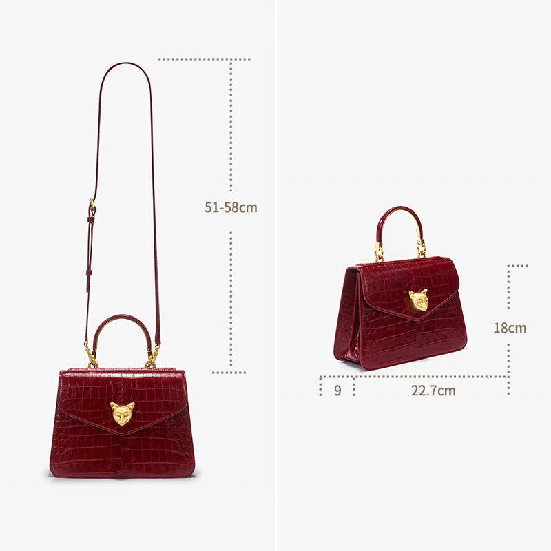 Rote Business-Ledertasche mit Kroko-Optik, Tragegriff und Schulterriemen, goldene Beschläge