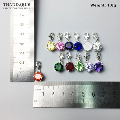 Sterlingsilber-Geburtsstein-Anhänger, mehrere farbige Steine nebeneinander gemessen