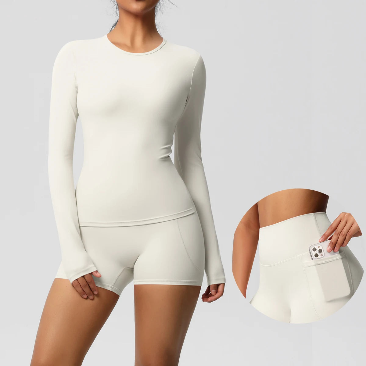 Damen-Yoga-Set Hellivory mit langarmigem Shirt und kurzen Shorts, Taschenöffnung