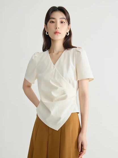 Langarm-Bluse mit V-Ausschnitt und Jacquard-Stoff im chinesischen Stil – einreihig geknöpft in zwei Farben.