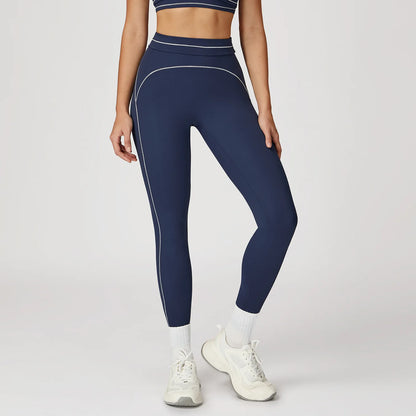 Dunkelblaue Yoga-Leggings mit Color-Block, schmalen Kontrastnähten und Konturstreifen