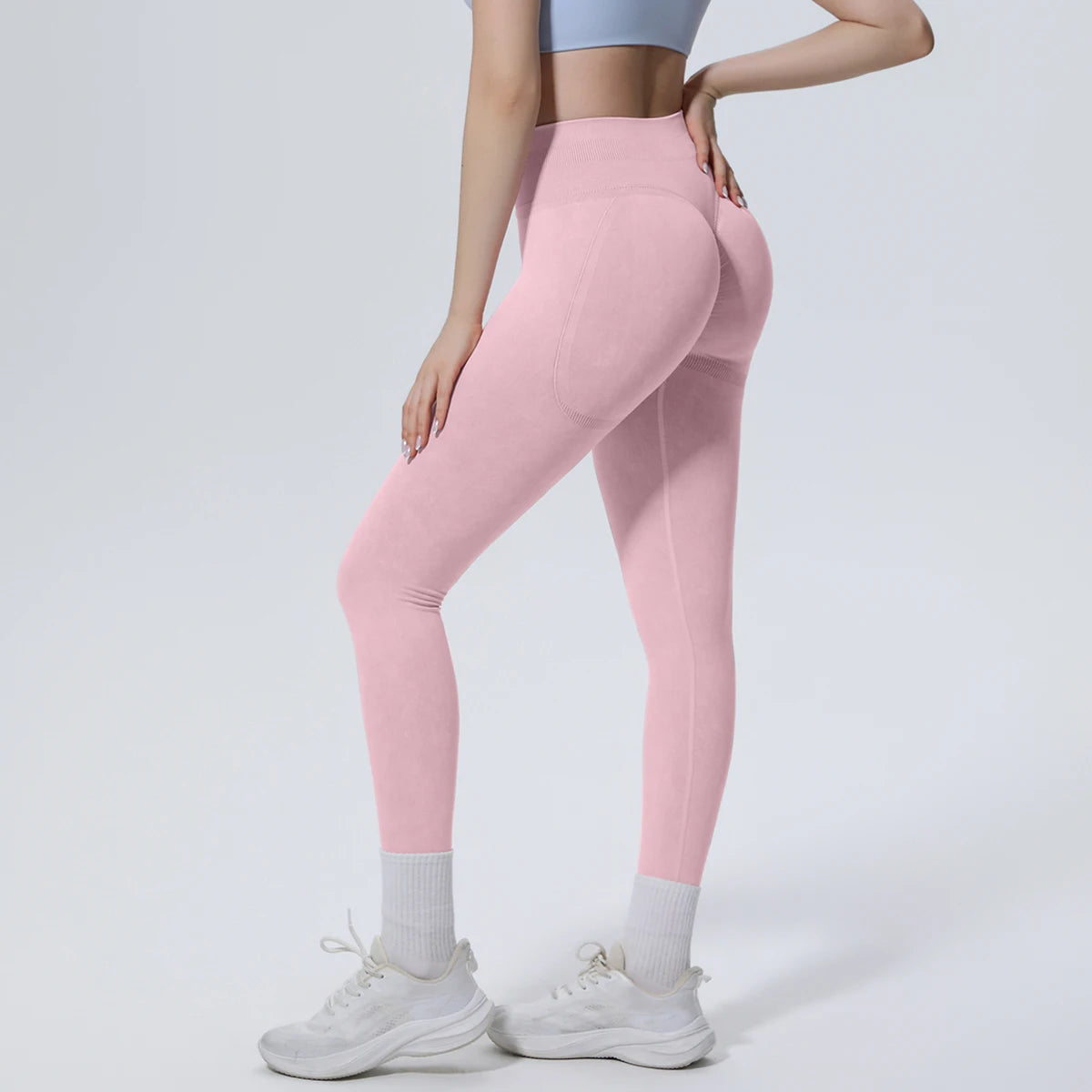 Rosa Yoga-Leggings mit push-up Effekt und schmalem Bein, knöchellang