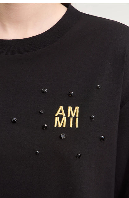 Damen T-Shirts im Minimalismus-Stil mit Stickerei und lässigen Ärmeln